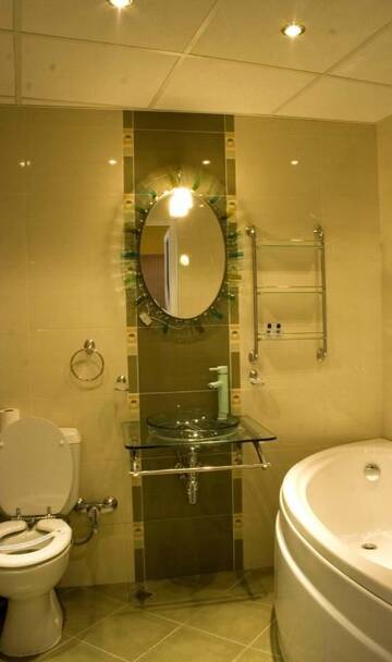 Фото номера Двухместный номер Делюкс с 1 кроватью Отель Family Hotel Zora г. Разлог 9